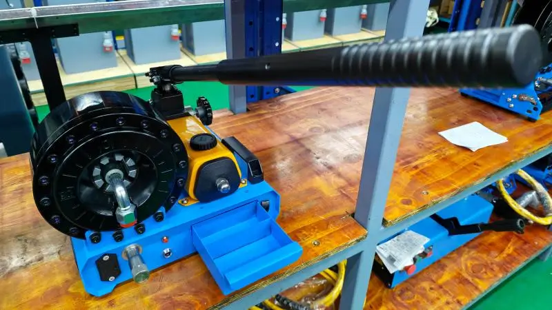 Hydraulic hose crimper in workshop operation