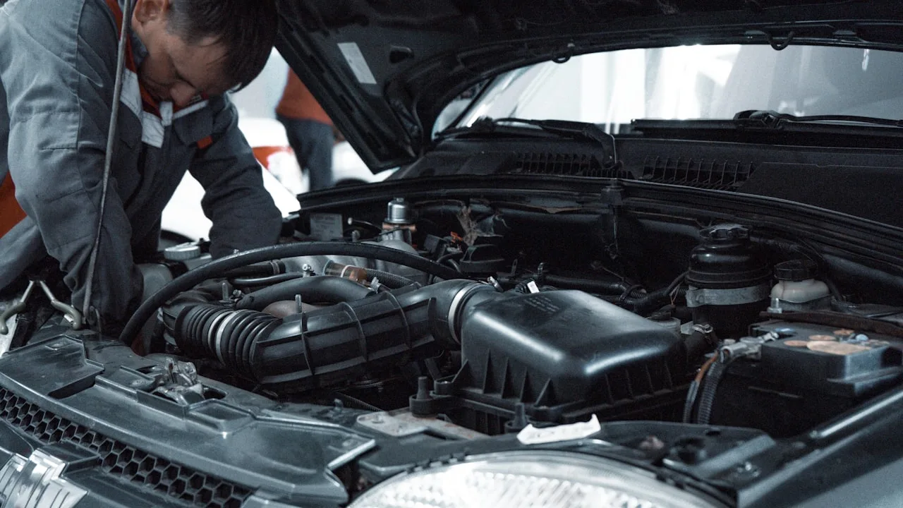 Technician identifying an automotive hose application